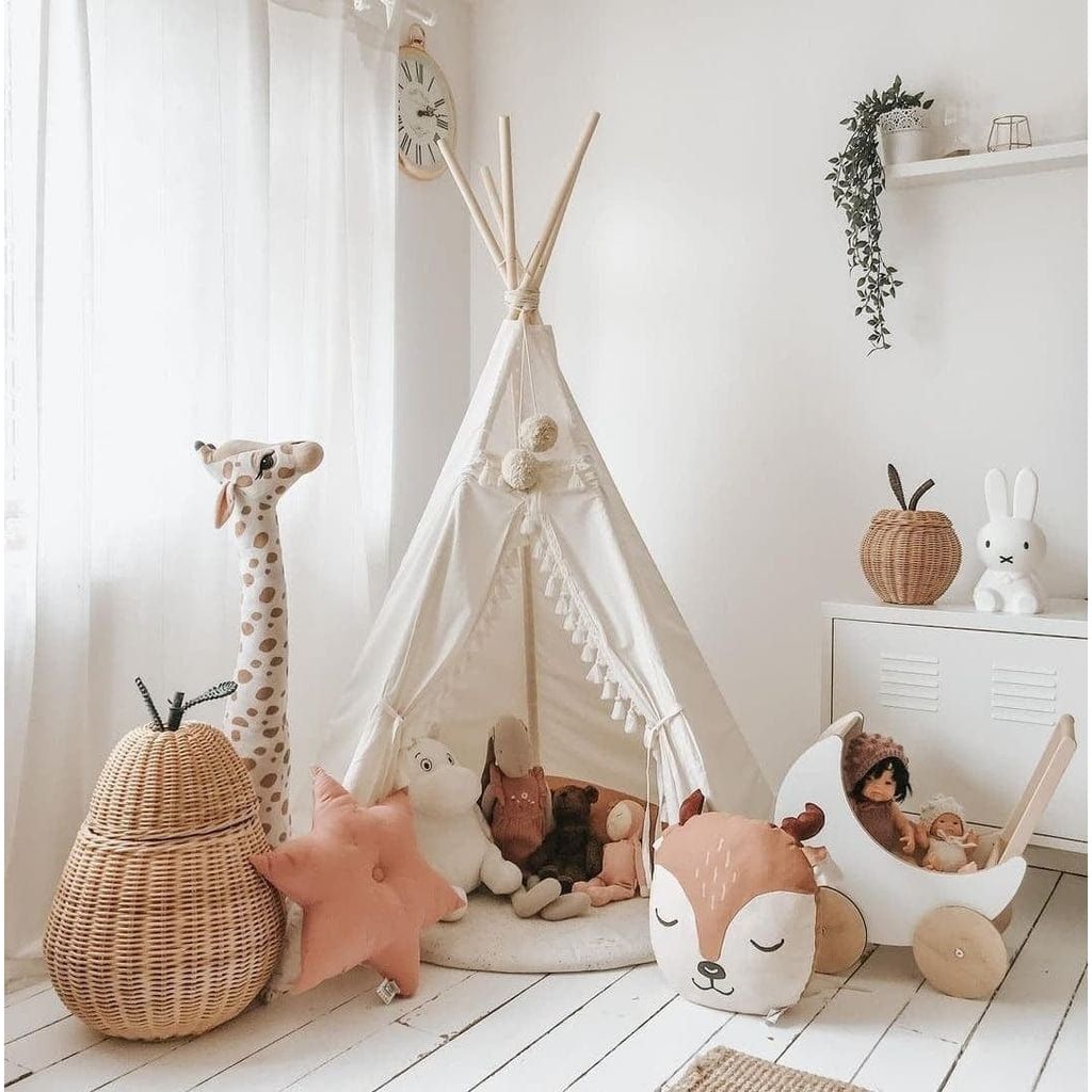 MINICAMP Boho Kids Teepee With Tassels in playroom with pram, basket and soft toys