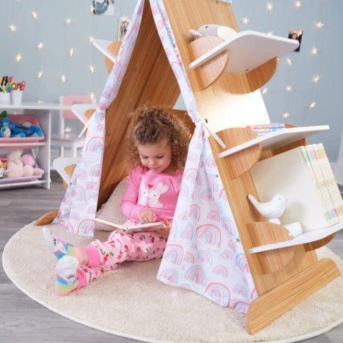 girl reading book under KidKraft Book Nook Tent with Shelves