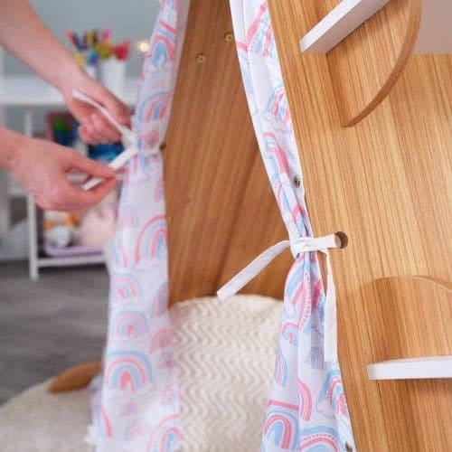 woman tying tent opening back on KidKraft Book Nook Tent with Shelves