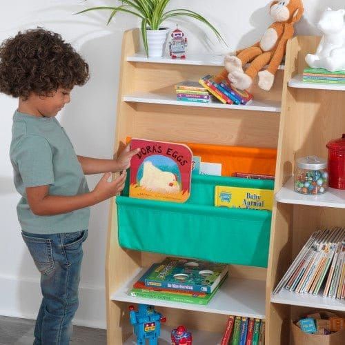 boy with book in front of KidKraft Pocket Storage Bookshelf - Natural
