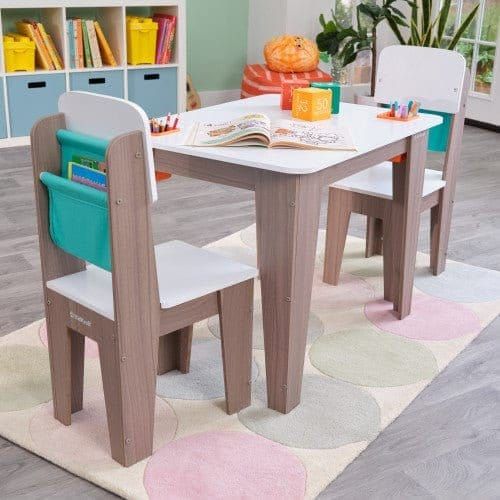 KidKraft Pocket Storage Table & 2 Chair Set - Gray Ash on rug in playroom rear view