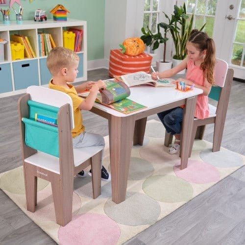 children sitting at KidKraft Pocket Storage Table & 2 Chair Set - Gray Ash in playroom