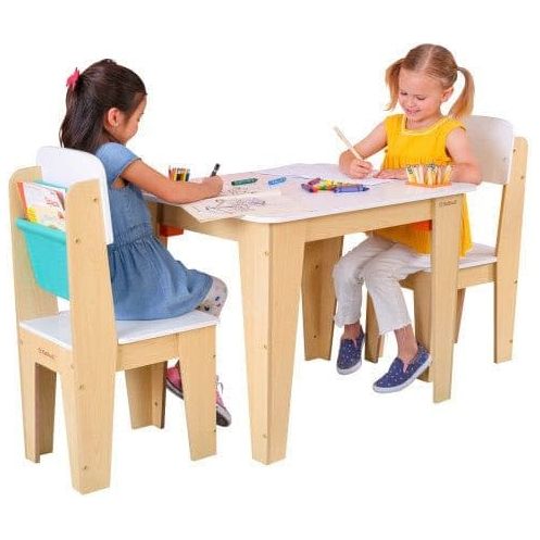 girls sitting at KidKraft Pocket Storage Table & 2 Chair Set - Natural and colouring in