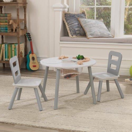 KidKraft Round Storage Table & 2 Chair Set - Grey & White on rug in playroom