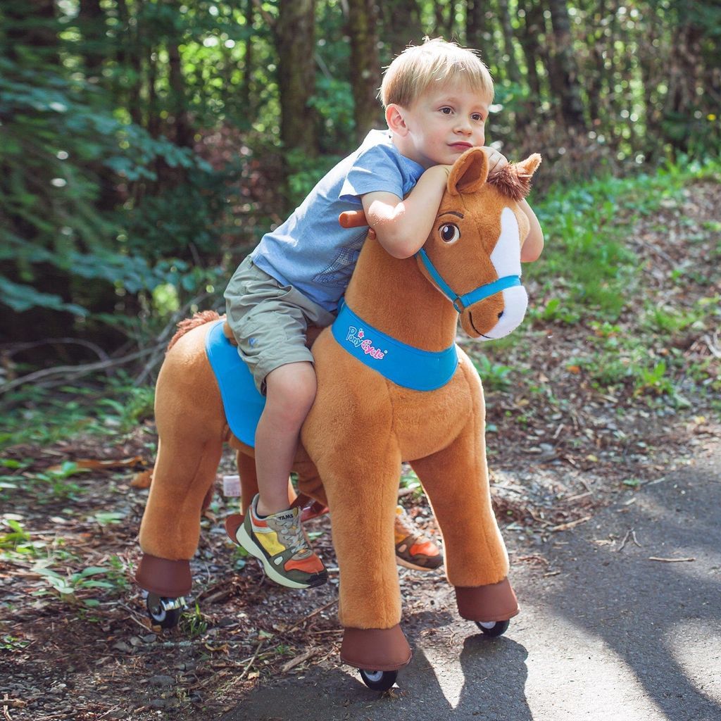 boy riding on Ponycycle Model E Toy Horse Riding Age 4-8