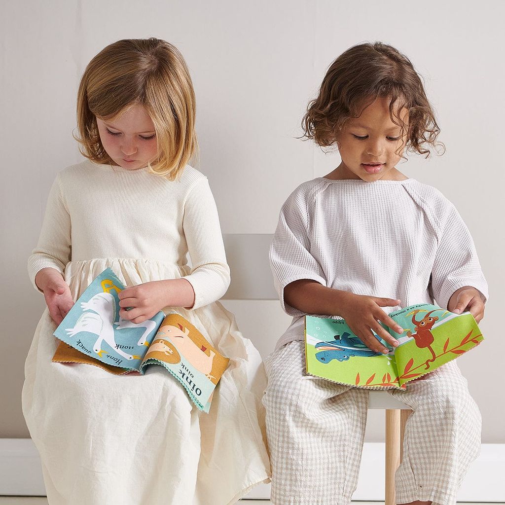 2 girls reading book from ThreadBear Brave as a Bear Toy & Book Bundle