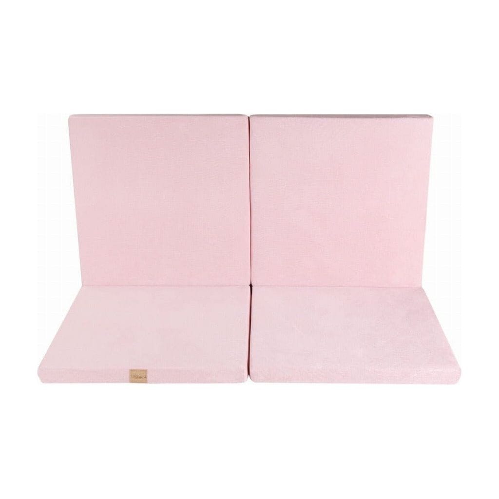 Meow Baby Square Foldable Baby Play Mat in pink folded against wall
