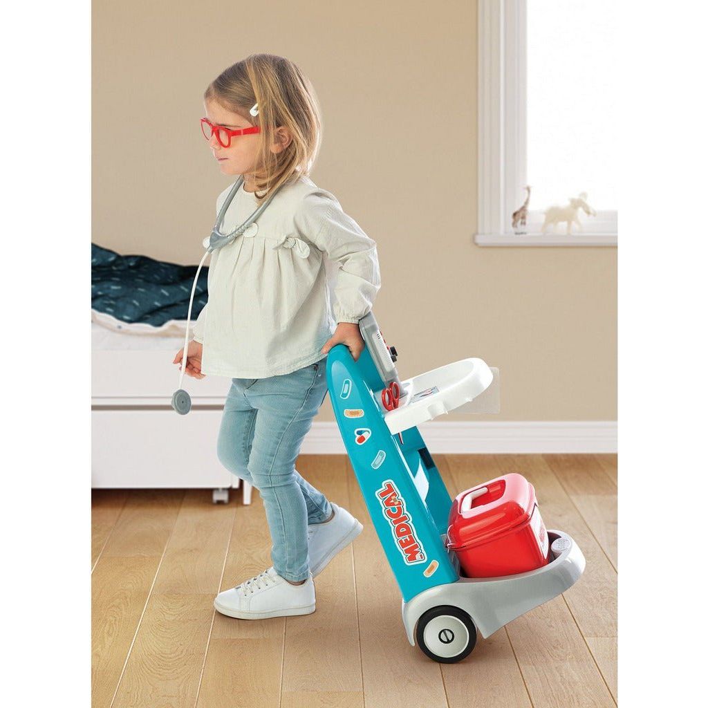 girl pulling Smoby Medical Rescue Trolley