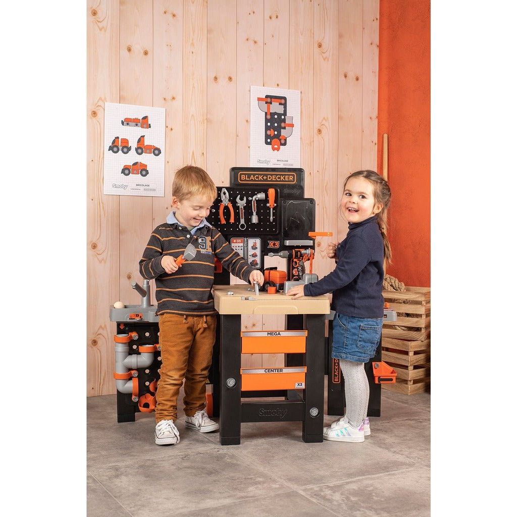 children playing with Smoby Black & Decker Mega Centre