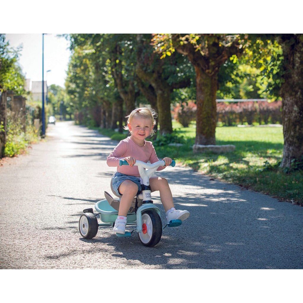 girl riding blue Smoby Baby Balade Trike 