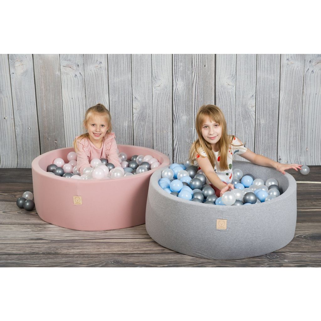 2 girls sitting in Misioo Joy Cotton Ball Pit Grey with 200 Grey and Blue Balls