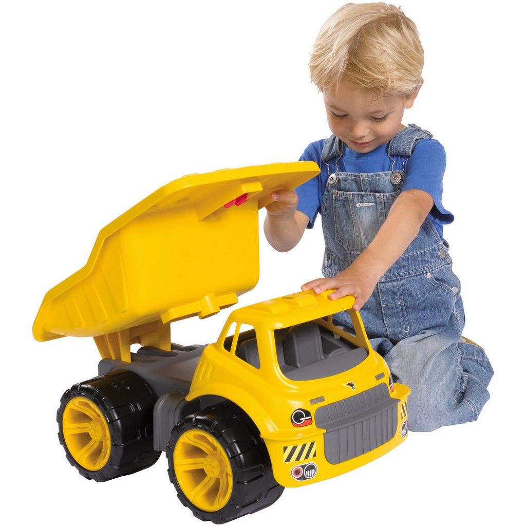 boy playing with Smoby Big Power Worker Maxi Truck 