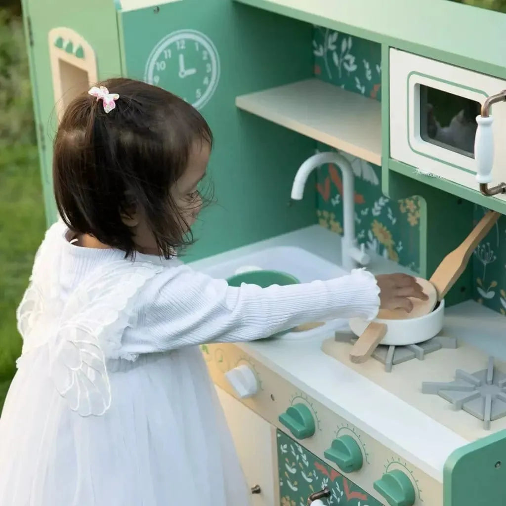 close up of girl playing with Classic World Wooden Vintage Kitchen