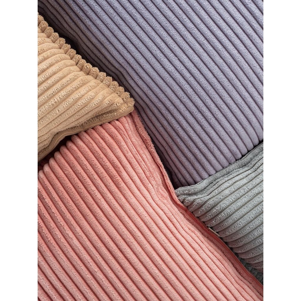 Wigiwama Pink Mousse Bolster Cushion fabric close up