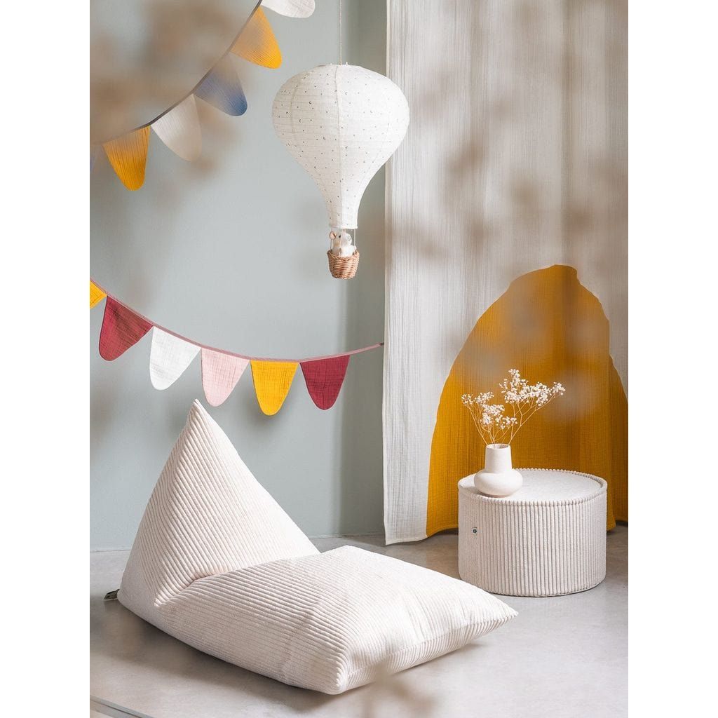 Wigiwama Marshmallow Pouffe next to big lounger kids furniture