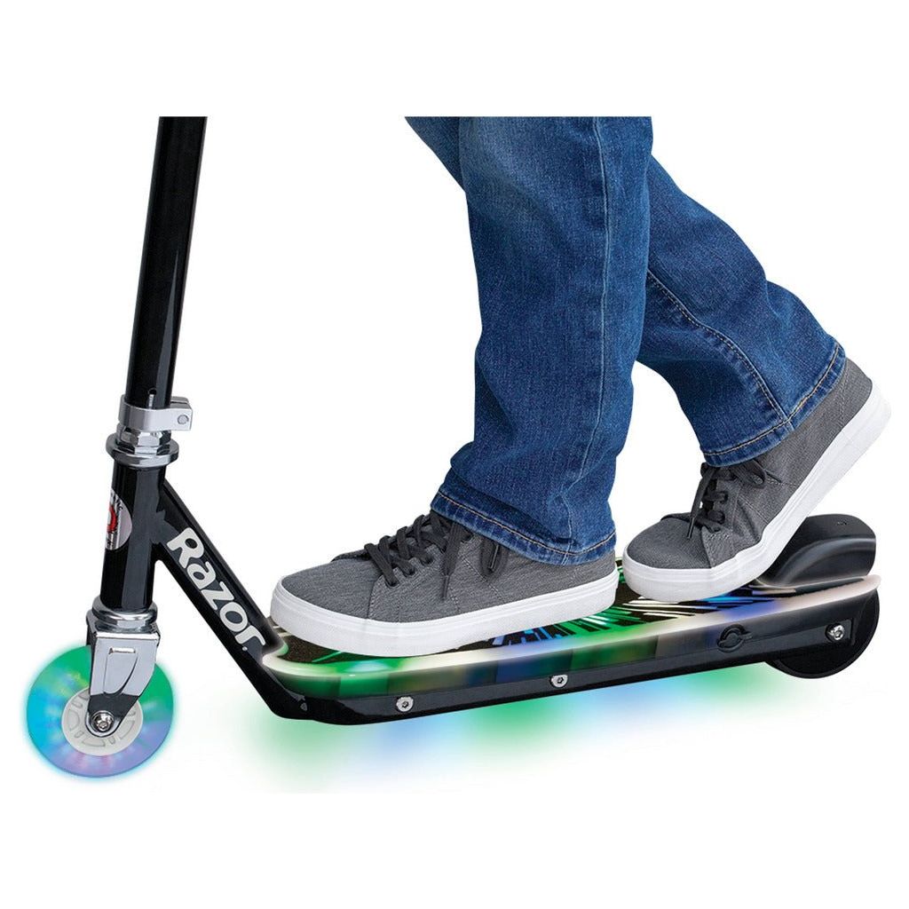 cloae up of feet on Razor Electric Tekno 10.8V Lithium-ion Scooter - Black