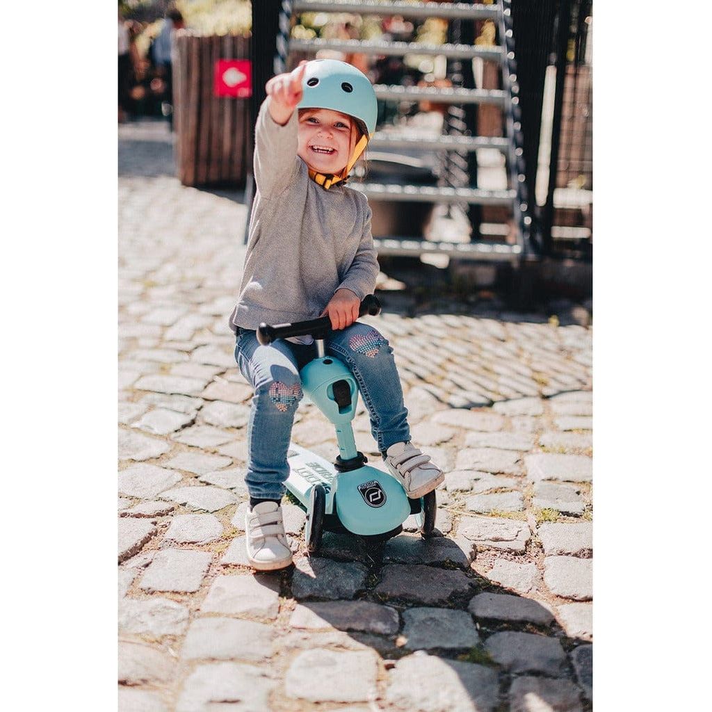 little girls sitting on Scoot and Ride Highwaykick 1 - Blueberry - Age 1-5 Years