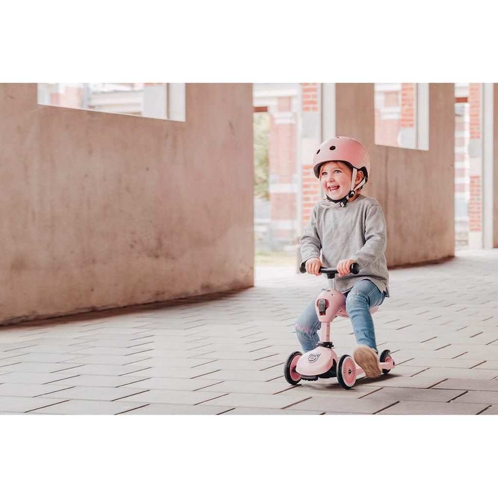 little girl sitting on Scoot and Ride Highwaykick 1  Scooter - Rose - Age 1-5 Years