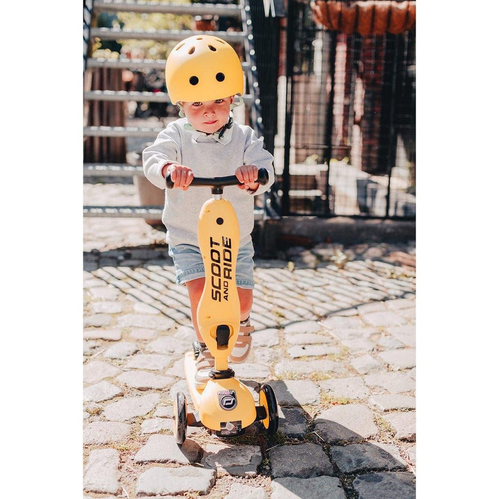 little boy riding Scoot and Ride Highwaykick 1 scooter - Lemon - Age 1-5 Years