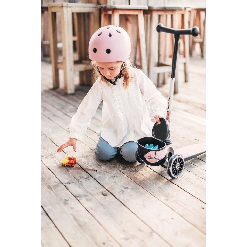 little girl kneeling next to Scoot and Ride Highwaykick 2 Lifestyle - Age 2 + - Reflective Rose