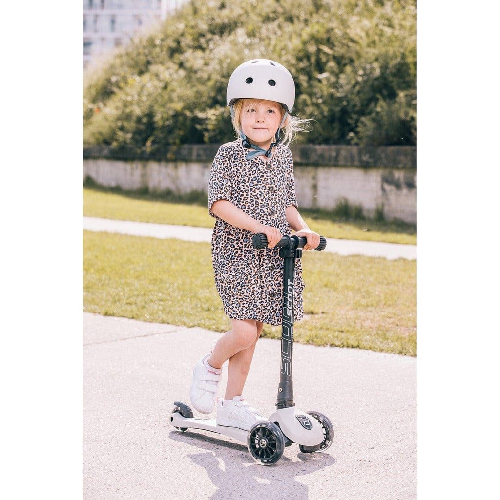 little girl riding Scoot and Ride Highwaykick 3 - Age 3+ - Led Ash on pavement
