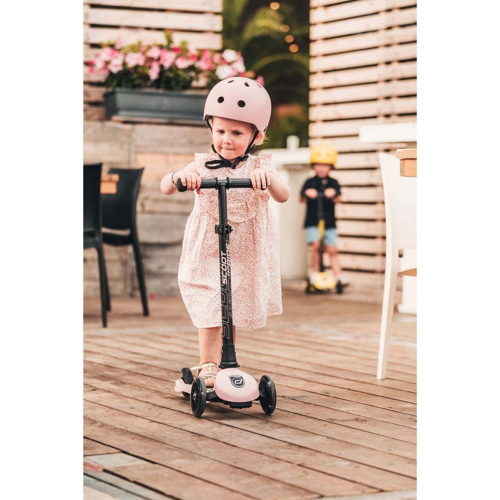 little girl riding Scoot and Ride Highwaykick 3 Scooter - Age 3+ - Led Rose