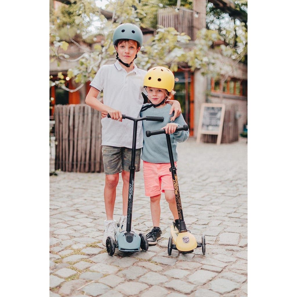boys next to each other with Scoot and Ride Highwaykick 3 Scooter - Age 3+ - Led Steel and yellow