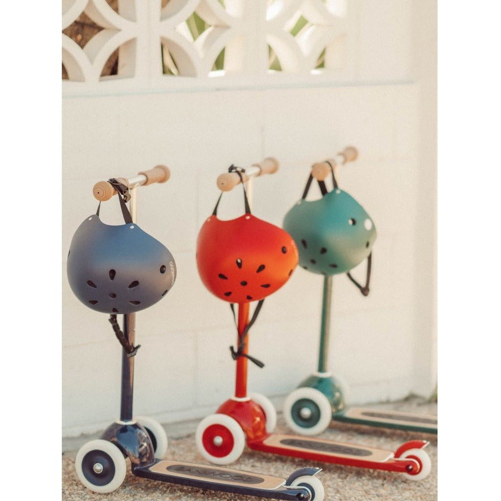 3 Banwood Scooters Age 3+ in Red, Blue and Green standing next to each other