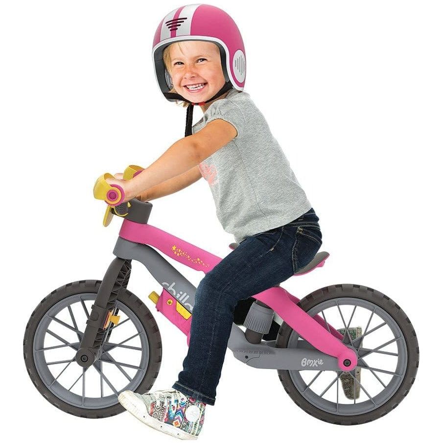 Little boy wearing Chillafish helmet and riding Bmxie Moto Bike 2-5 Years in Pink