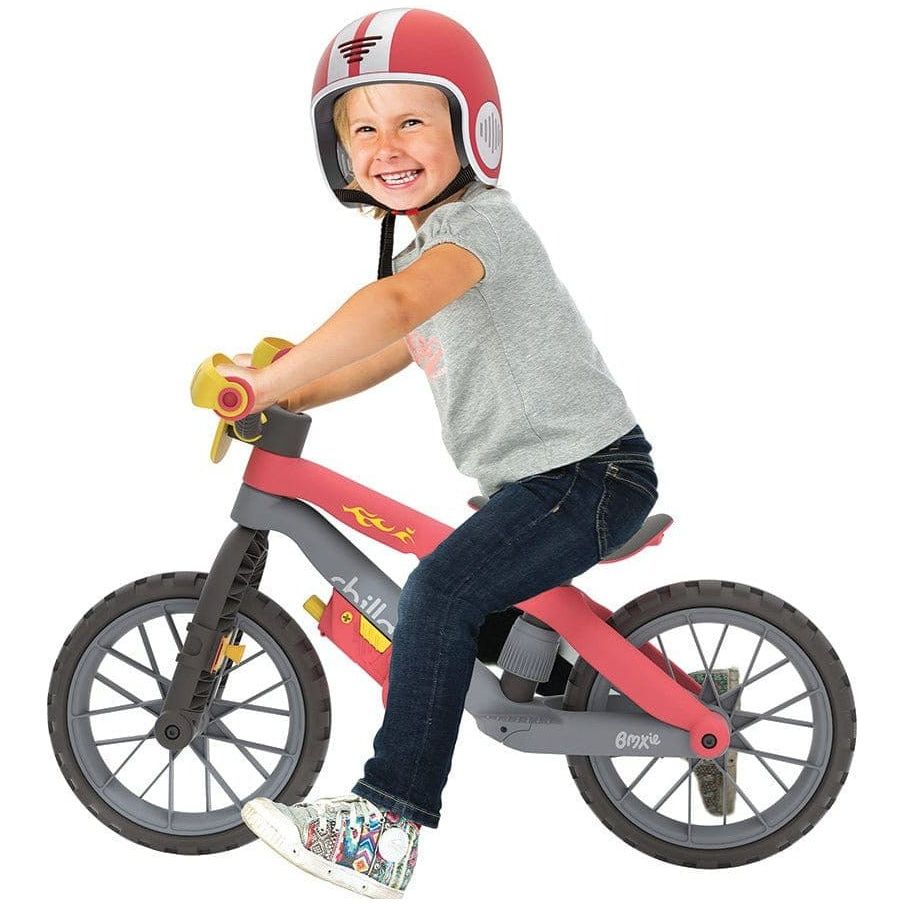 Little boy riding Chillafish helmet and Bmxie Moto Bike 2-5 Years in Red