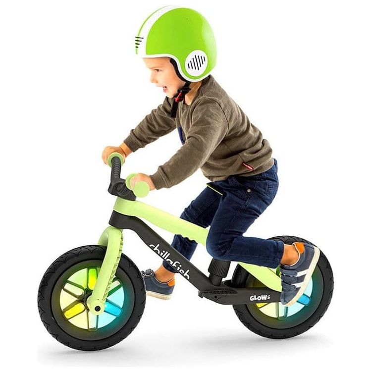 Little boy riding Chillafish Bmxie Glow Balance Bike 2-5 Years in Pistachio Green