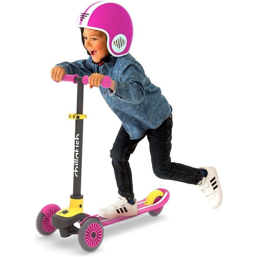 boy riding Chillafish Scotti Scooter in Pink