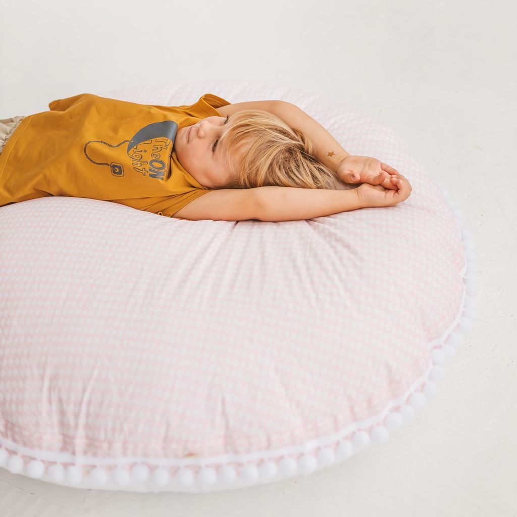 child lying on back on MINICAMP Big Floor Cushion Rhombus Diamond - Pink