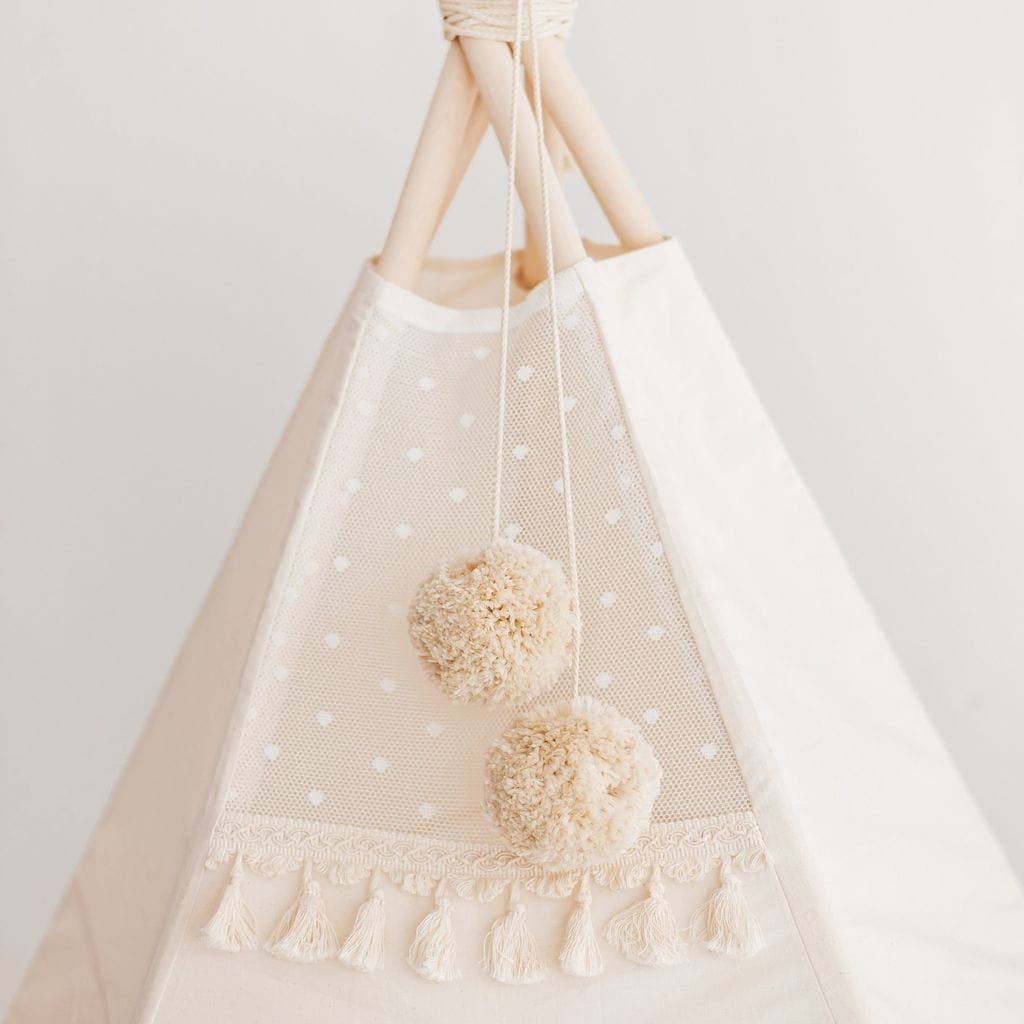 close up of MINICAMP Extra Large Indoor Teepee Tent With Tassels Decor in Boho Style