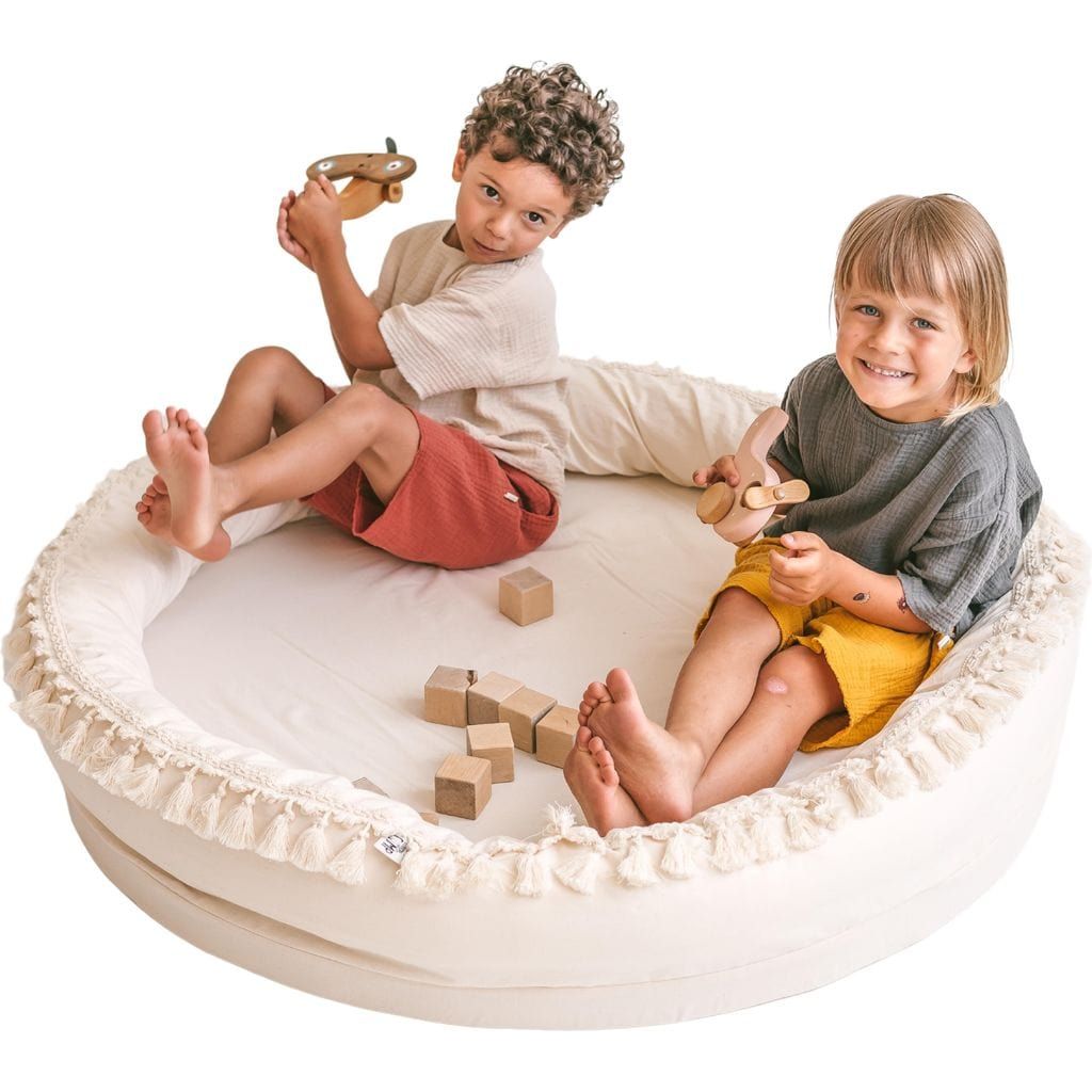 boy and girl sitting in MINICAMP Large Play & Rest Kids Lounger