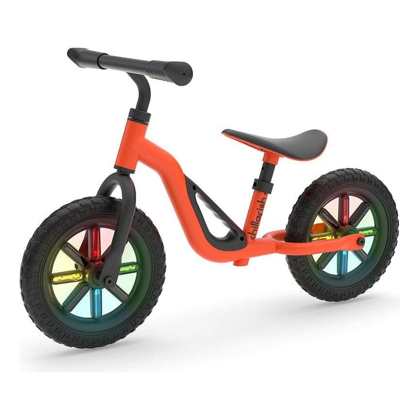 Chillafish Charlie Glow Balance Bike 18M-4Y in Orange with light up wheels