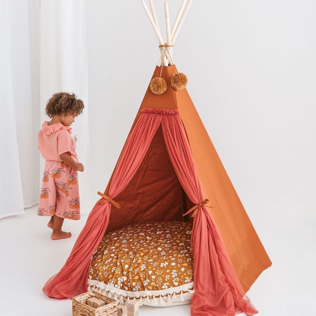 girl stabding next to MINICAMP Fairy Kids Play Tent With Tulle in Cognac