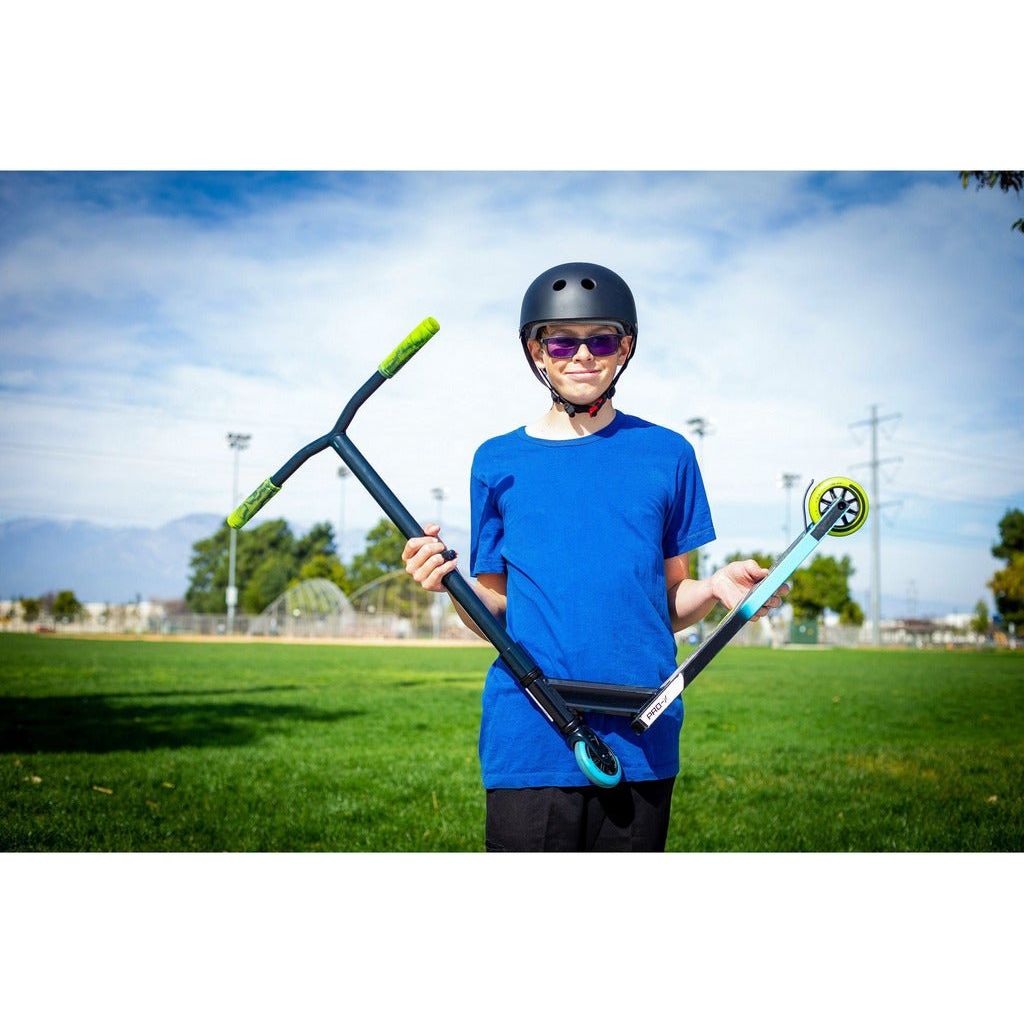 boy holding Razor Pro-X Scooter