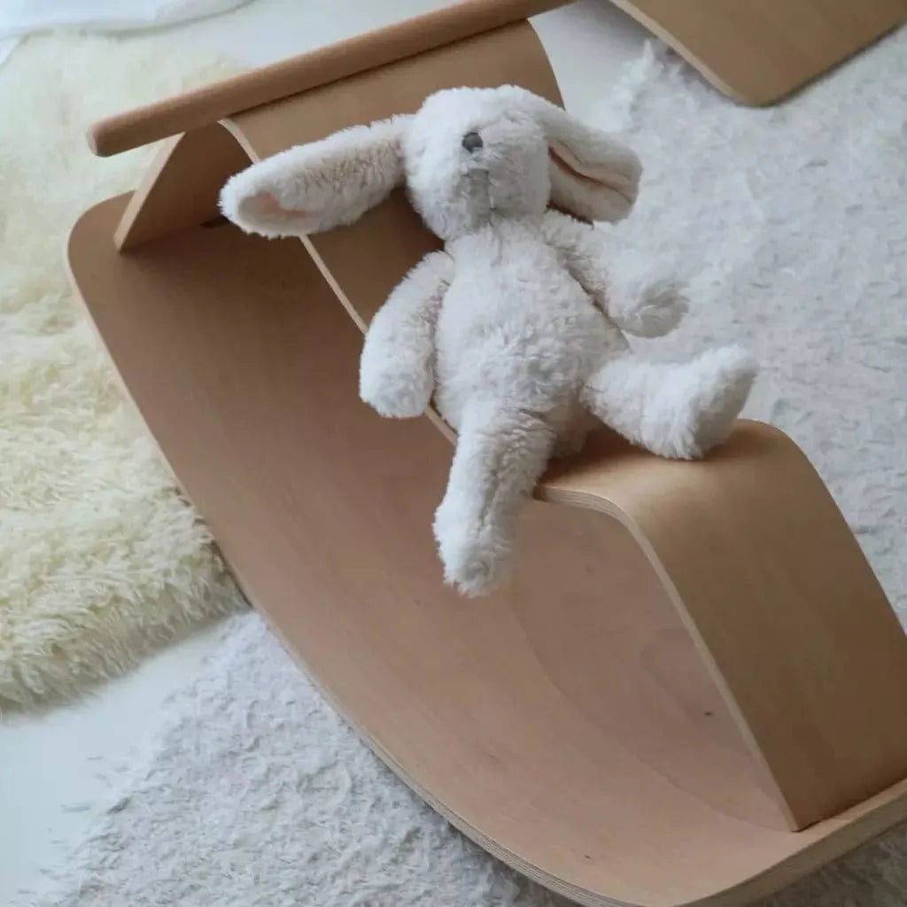 rabbit teddy on Curve Lab Rocking Horse & Perfect Arc Balance Board