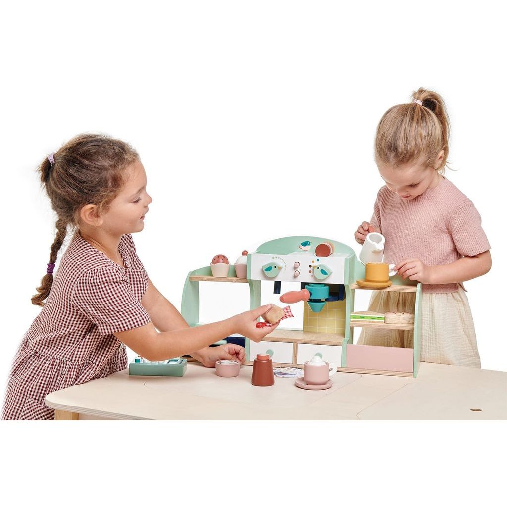 2 girls playing with Tender Leaf Bird's Nest Wooden Cafe Set