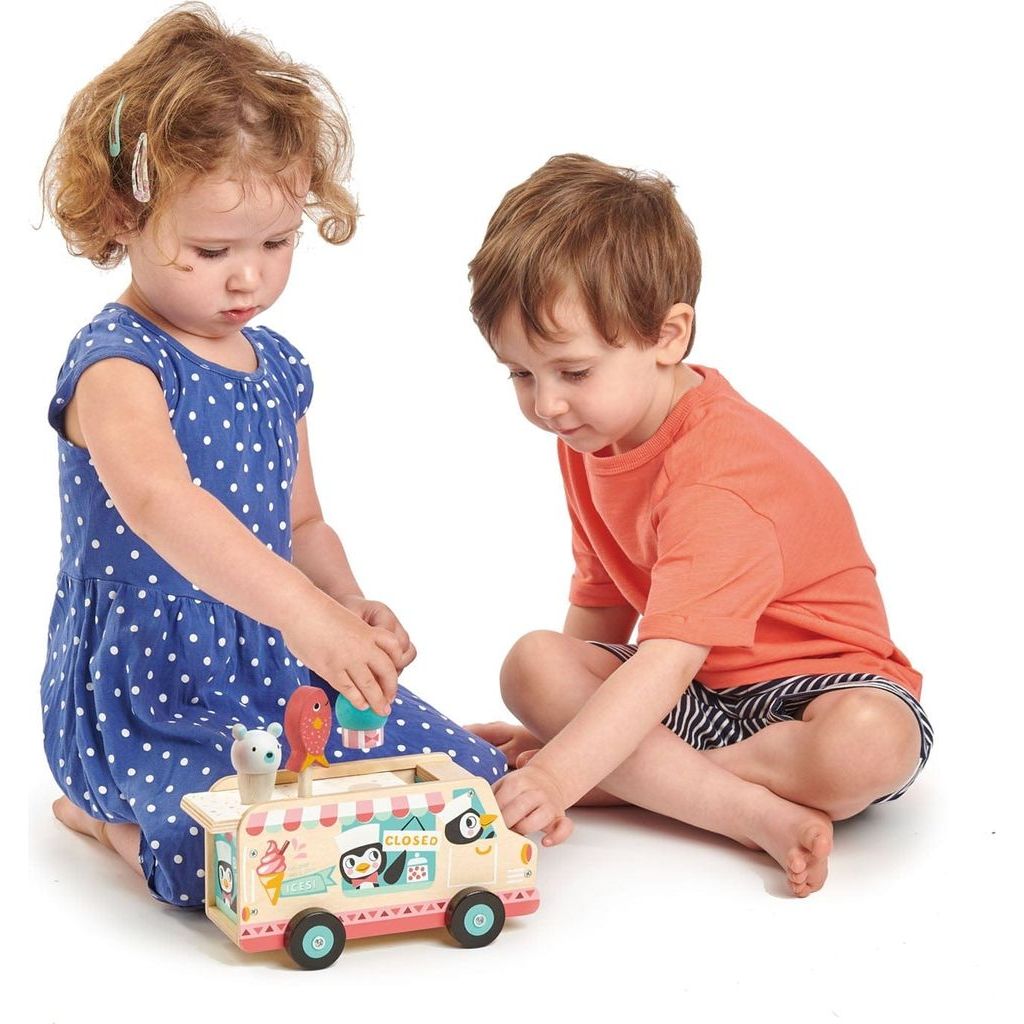 boy and girl playing with Tender Leaf Penguin's Wooden Gelato Van