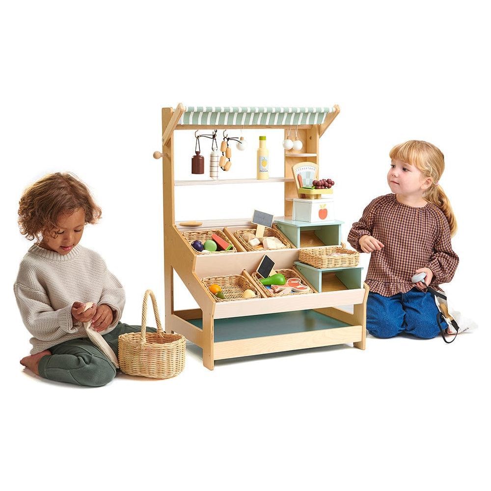 boy and girl playing with Tender Leaf General Stores Kids Wooden Market Stall