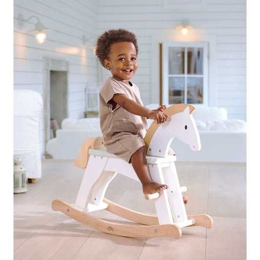 boy riding Tender Leaf Lucky Wooden Rocking Horse