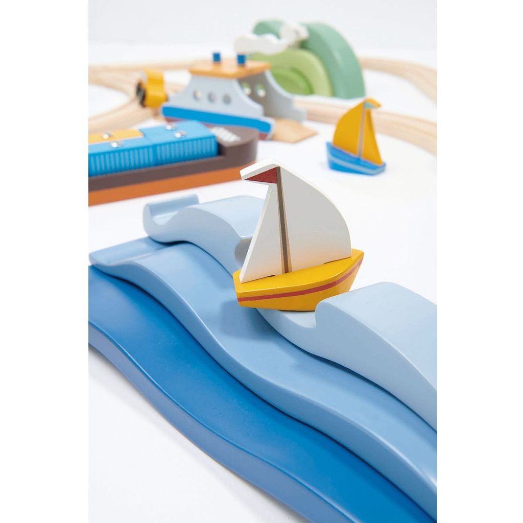 close up of water and boat from Tender Leaf Train Accessory 2 Piece Bundle