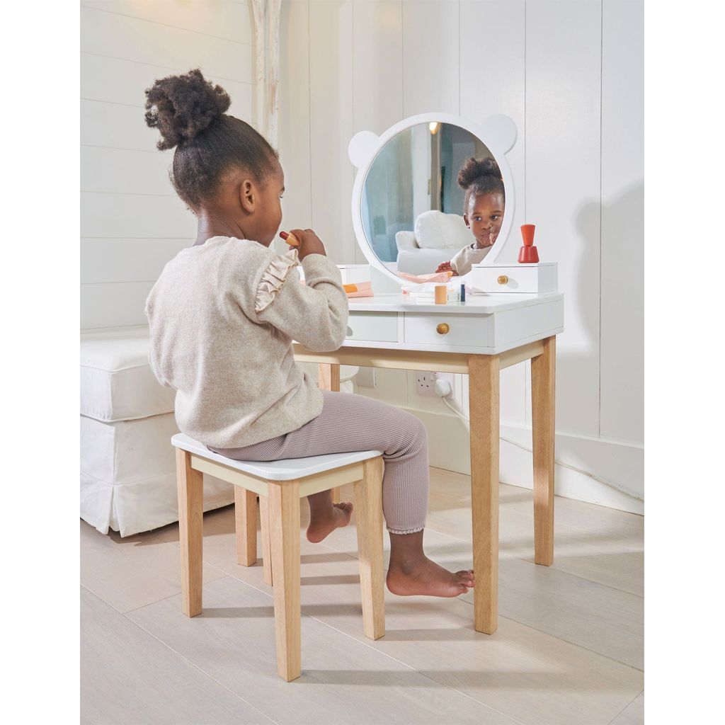 girl sitting at Tender Leaf Forest Wooden Dressing Table in bedroom