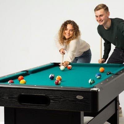 woman and man plsying on Gamesson 7Ft Harvard Pool Table