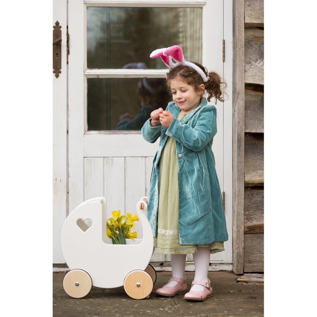 girl by door with Moover Wooden Dolls Pram - 2 Years+ - White