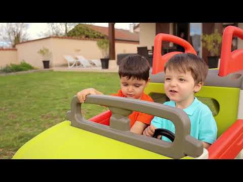 children playing in Smoby Adventure Car with Slide & Sandpit