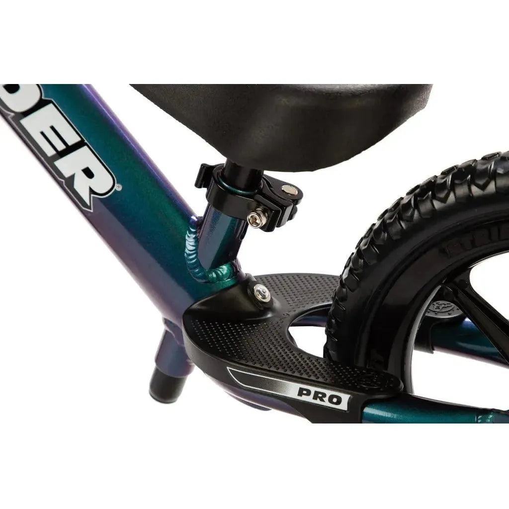 Strider Pro 12 inch Balance Bike - Metallic Aqua footrest close up