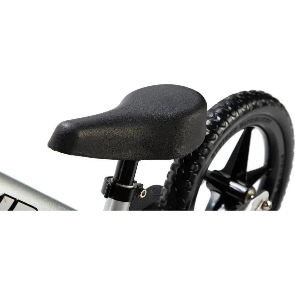 Strider Pro 12 inch Balance Bike - Silver seat close up